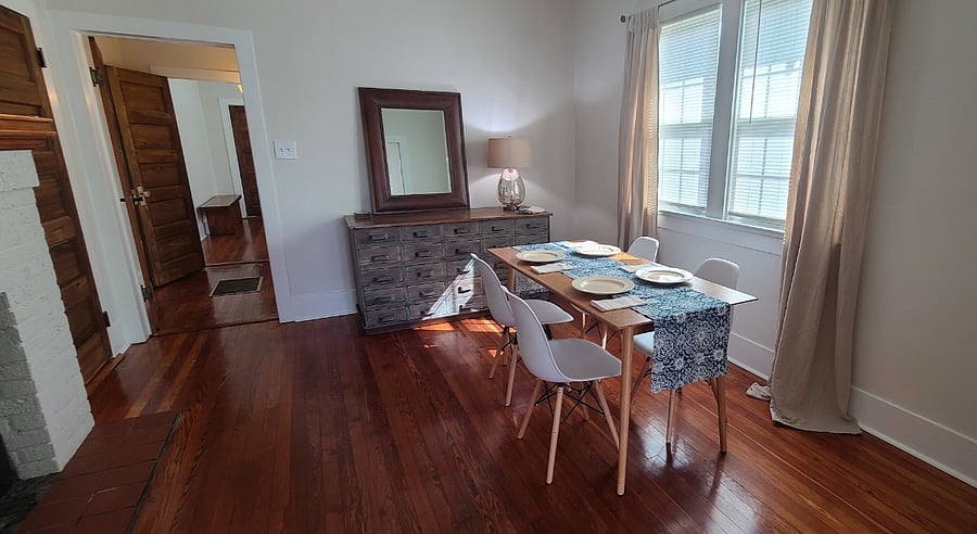 Dining room with table seating for 4. 