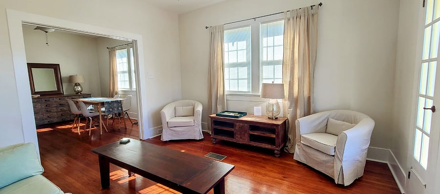 Living Room with seating, tables, and lighting.