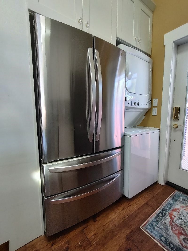 Washer/dryer...regular sized.    And, LG 36" fridge.