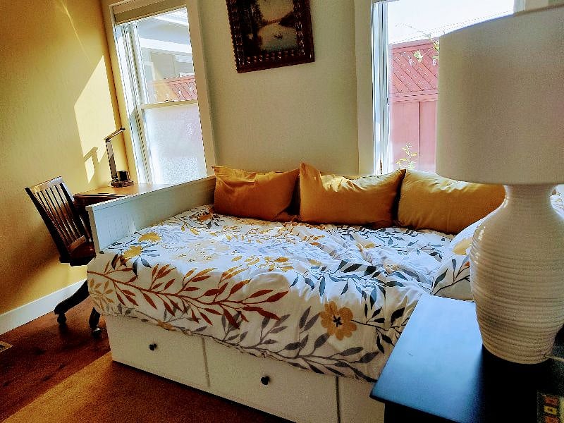 Twin Day bed that easily converts into a king bed.   3 large drawers underneath for extra storage.