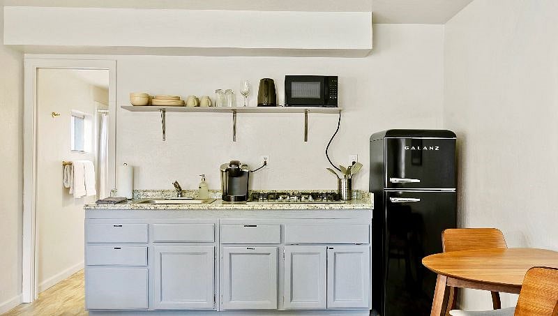 Gas stove, fridge, Keurig, cookware and dishes