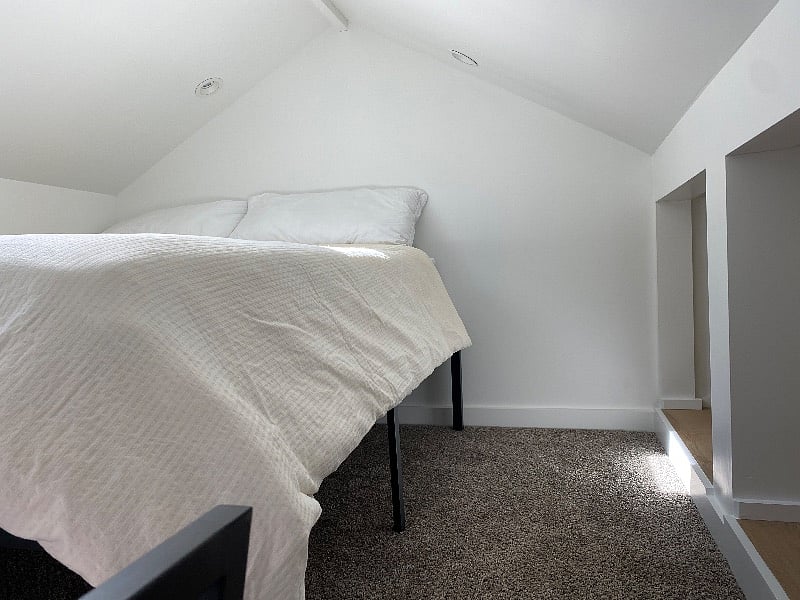 Bedroom with storage cubbies