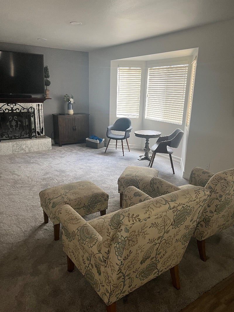 This is the family room with plenty of space to sit and watch TV.