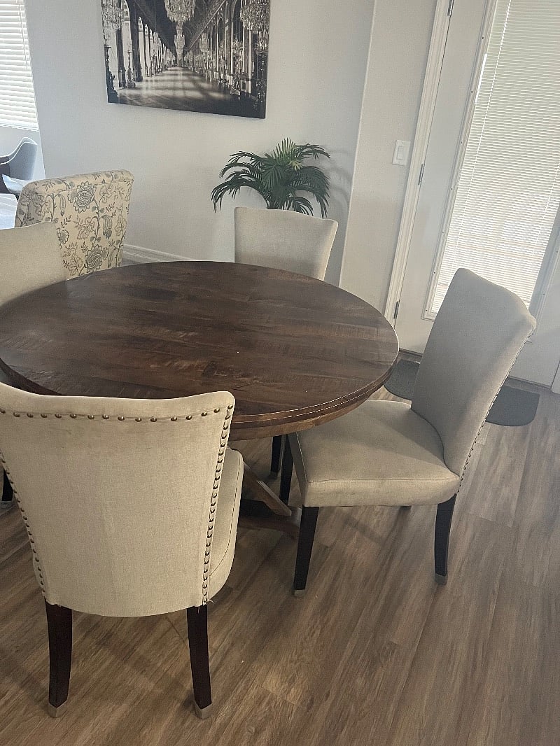 Small dining table connected to the kitchen and family room. Enjoy your meal while watching TV.