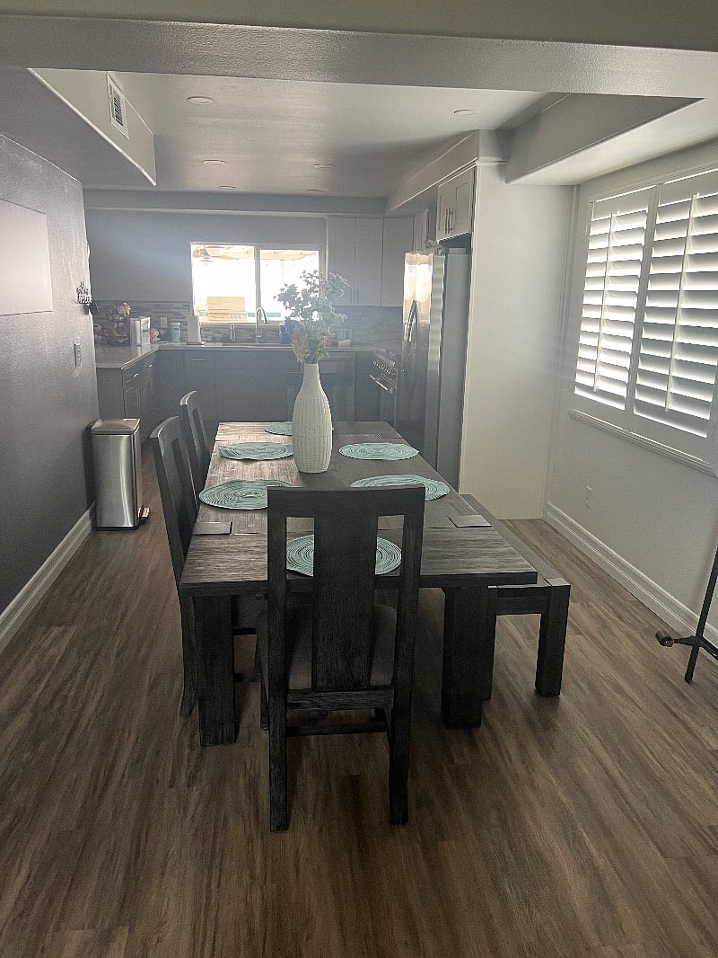 The large dining area looking toward the kitchen.