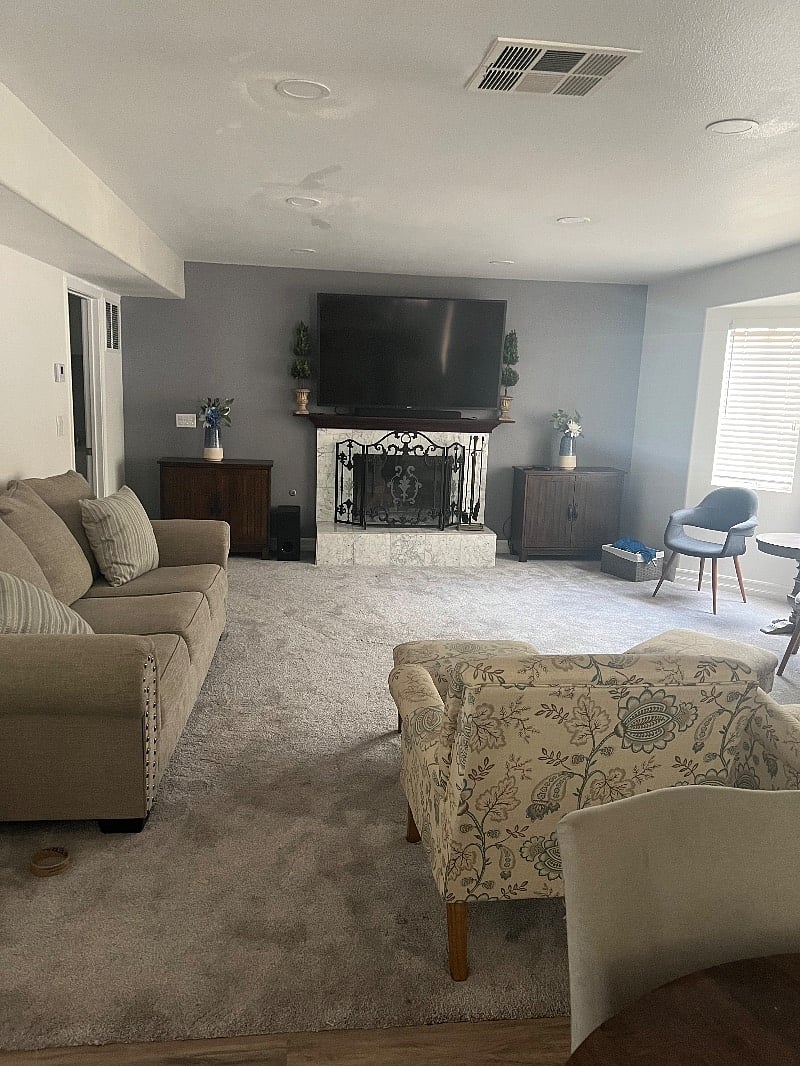 Family room with a 70" smart TV.