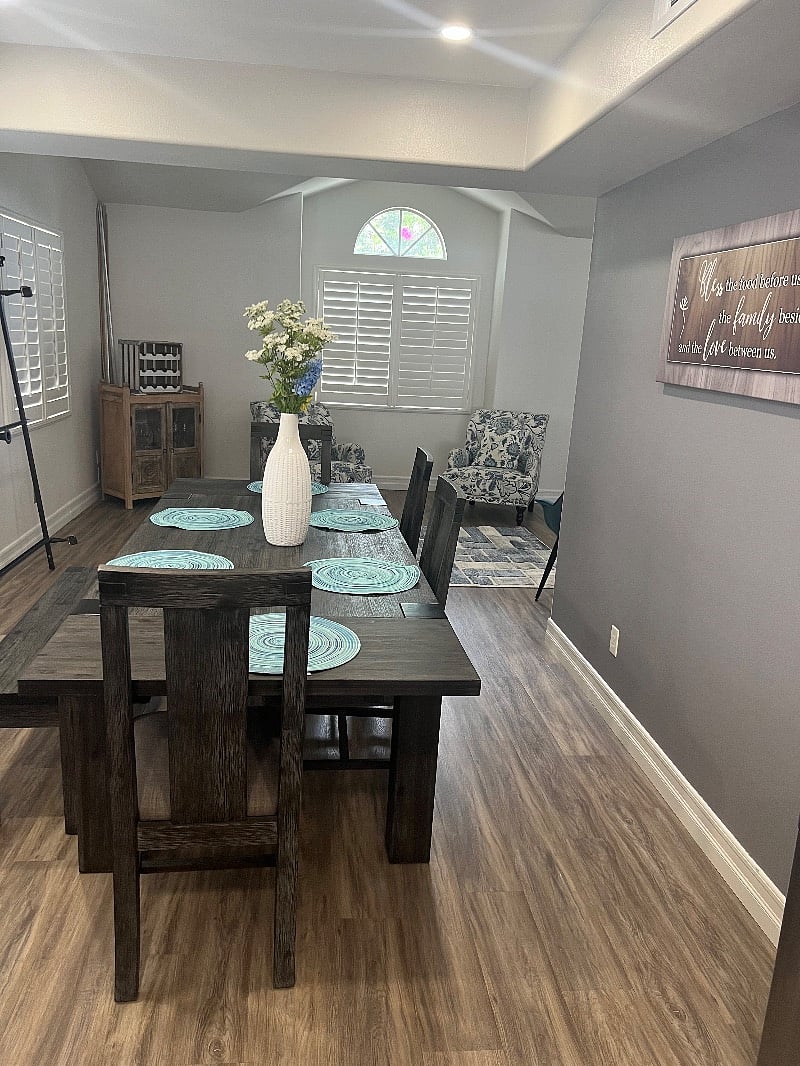 Formal dining area next to kitchen and living room.