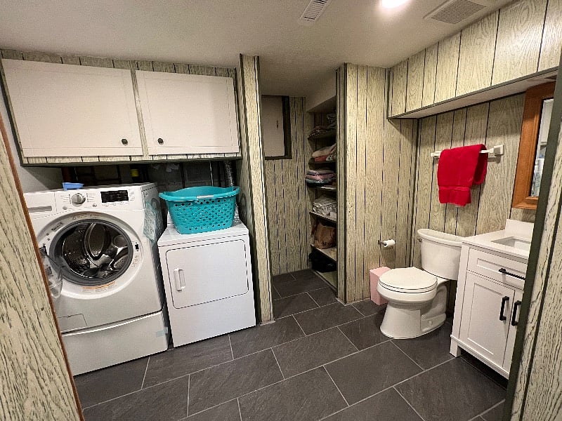 Lower-level laundry and half bath