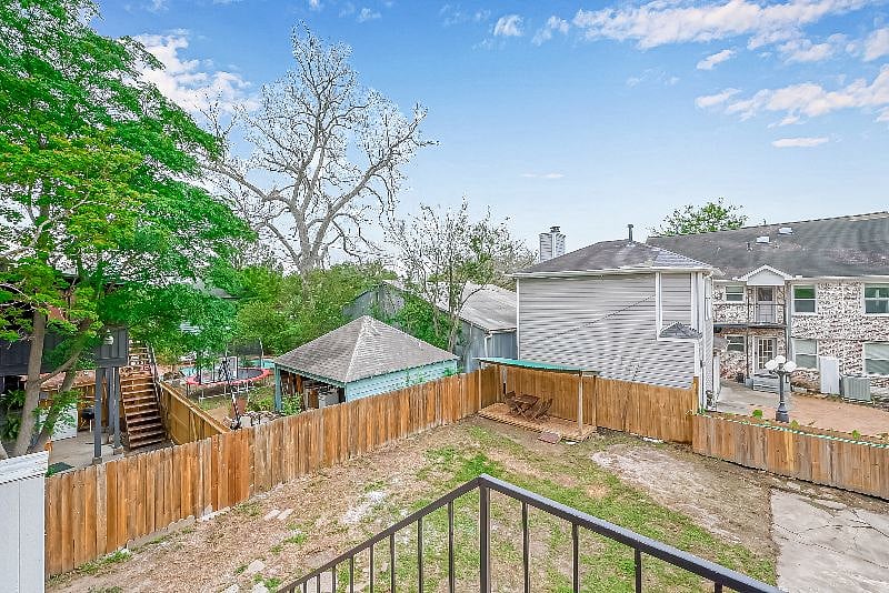 1711 Maryland 77006: View of Backyard from Back Entrance. 