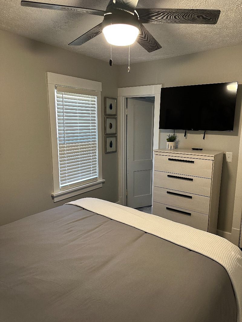 Bedroom has its own smart TV.