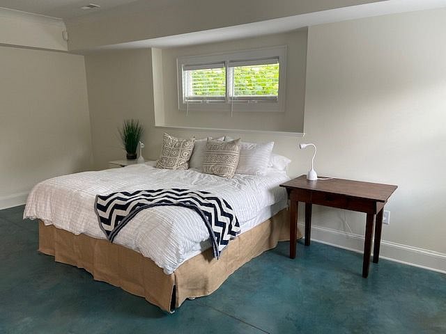 King size bed with two down pillows and two polyester filled pillows. Down duvet.