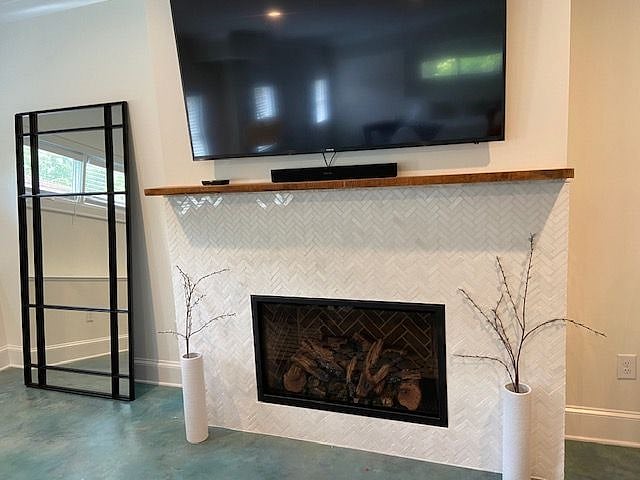 New, custom, marble gas fireplace surround.