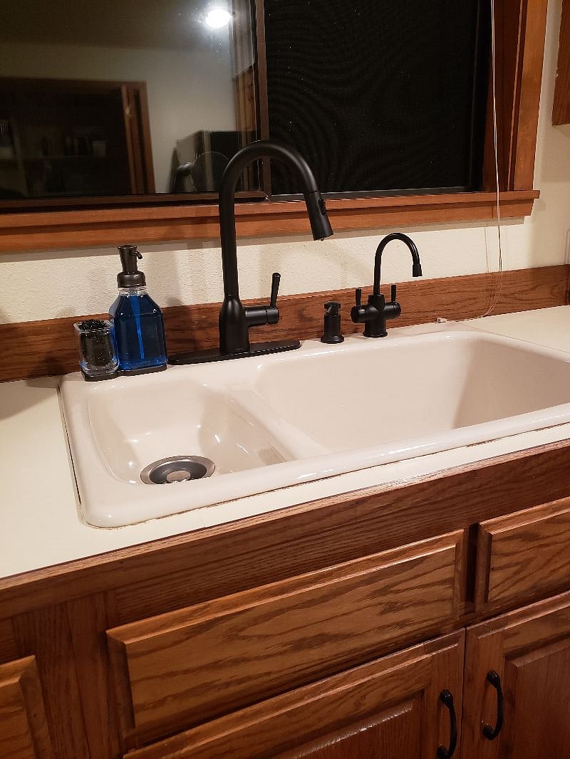 New instant hot and cold dispenser at sink.