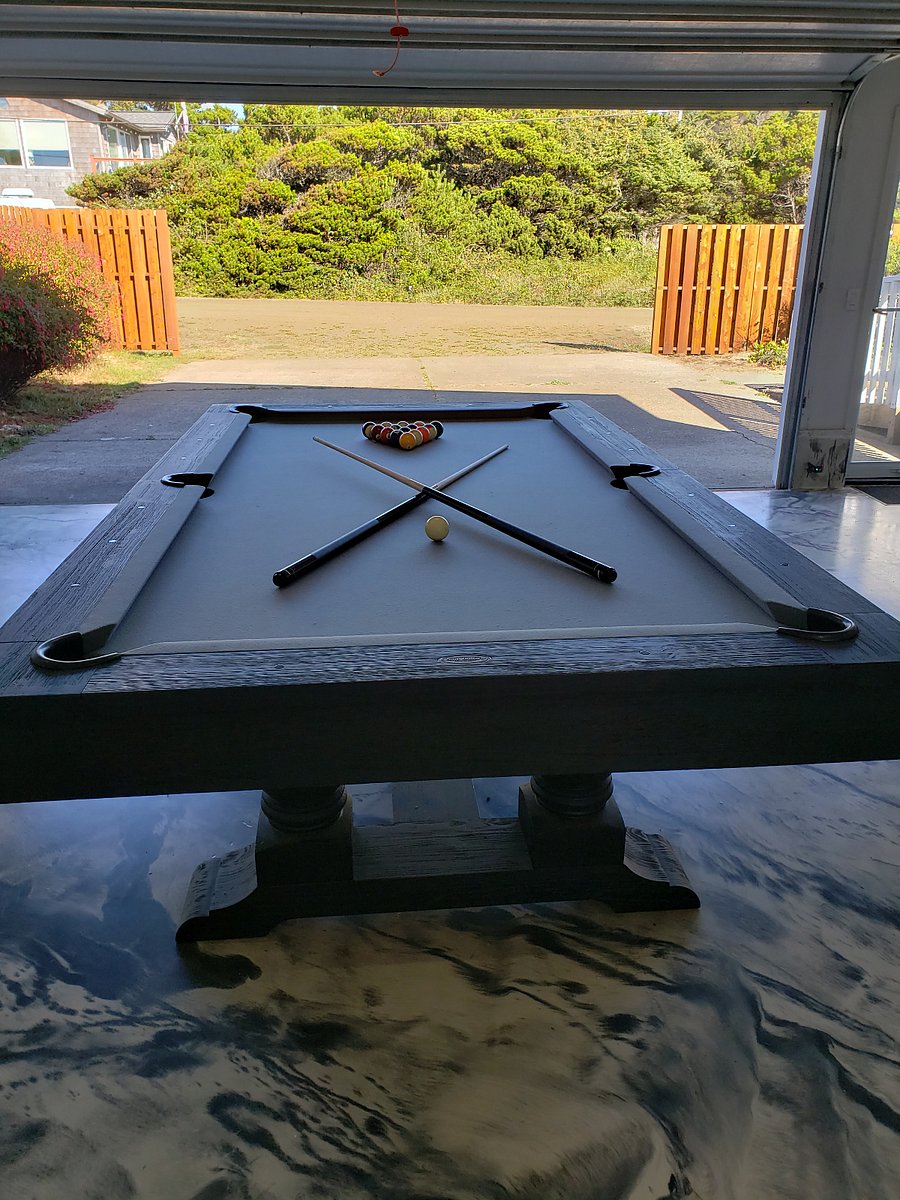 Brand new pool table in heated garage.