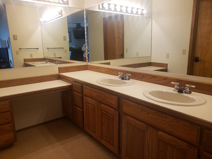 Double sinks and lots of counter space in master bedroom bathroom.