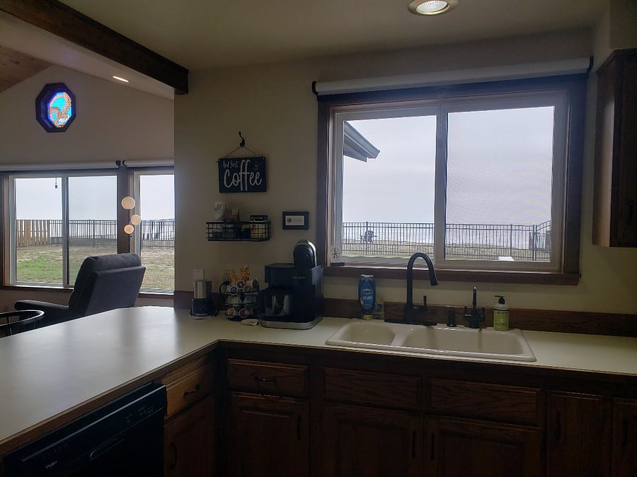 Kitchen and living room with open floor plan.