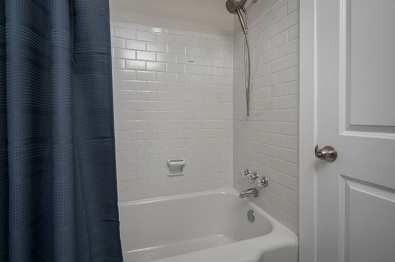 Take a shower with the handheld shower head or take a bath in the large tub!
