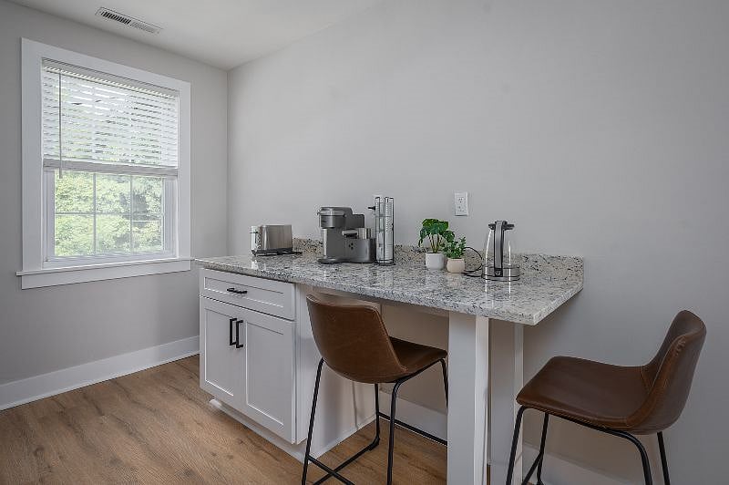 In a rush or don't feel like walking ALL the way over to the dining room table? Pull up a chair and just sit at the counter.