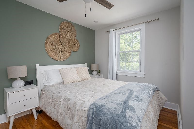 Nectar Queen mattress with memory foam pillows and cotton bed sheets. Make sure to set the alarm!