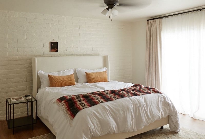 Master bedroom with a king bed, own bathroom with double vanity sinks, stand up shower and large walk in closet. Assess to backyard.