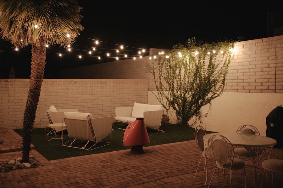 String lights and BBQ grill. 