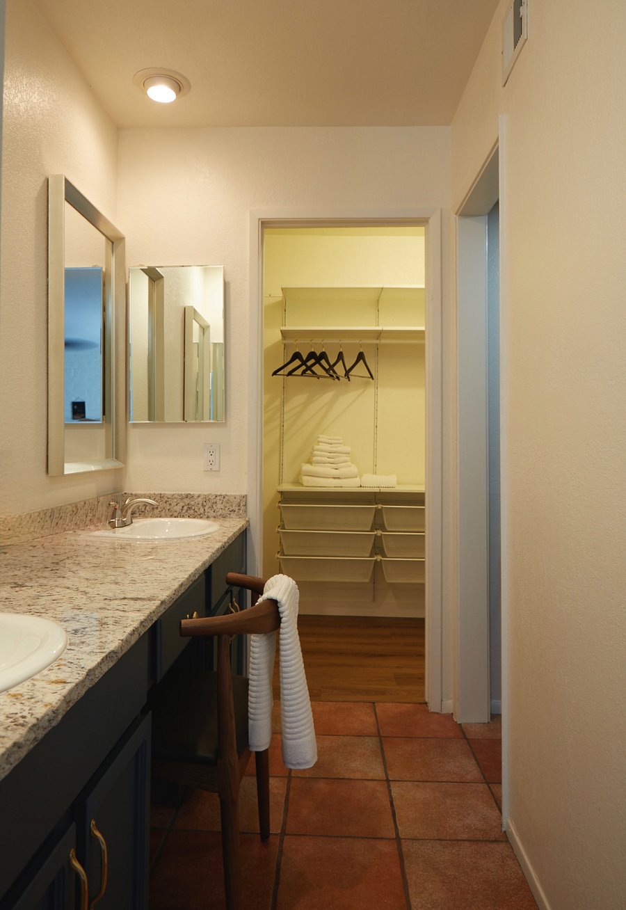 Master bathroom/closet, double vanities, walk in closet, stand up shower.