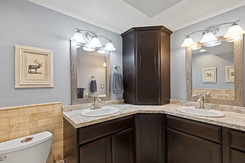 Double sinks in master bathroom.