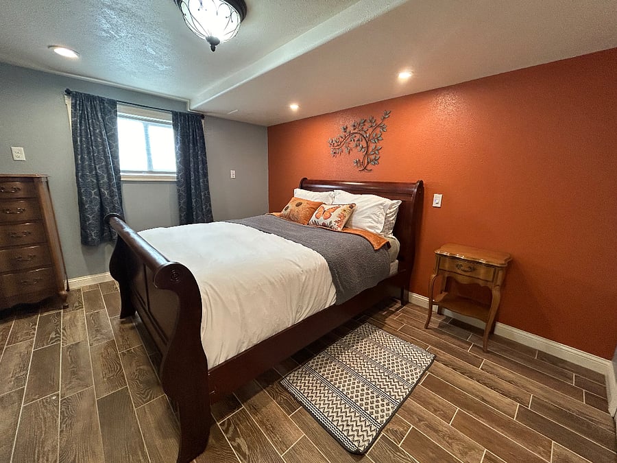 Queen bedroom which opens into the marble shower and claw foot tub. Walk in closet.