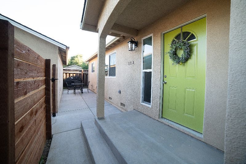 Front of the unit with fence.