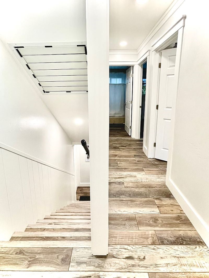 Stairwell and hallway to bedrooms and bathroom