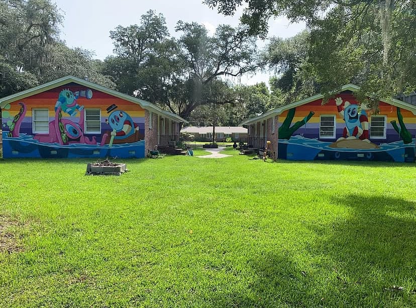Backyard has fun mural by local artist Patch Whiskey. Perfect for a instagram moment.