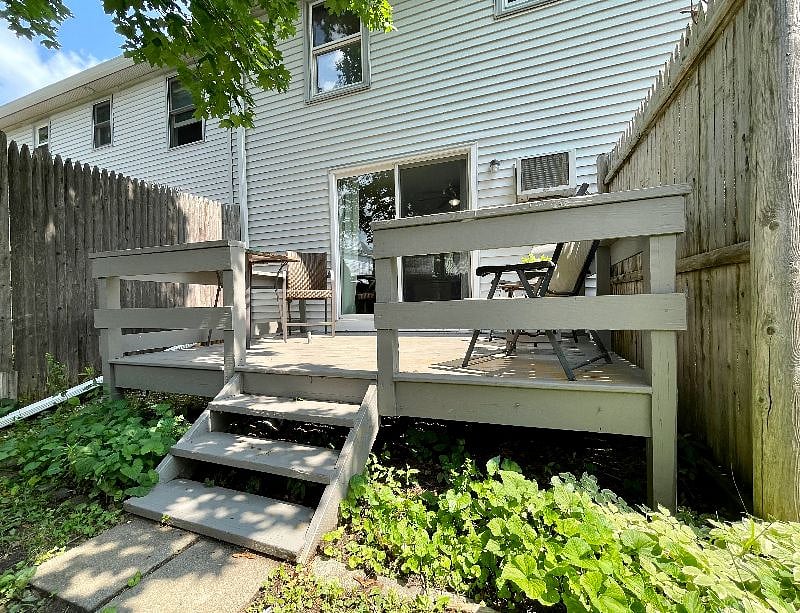 Tiny little yard area, looking up to back deck