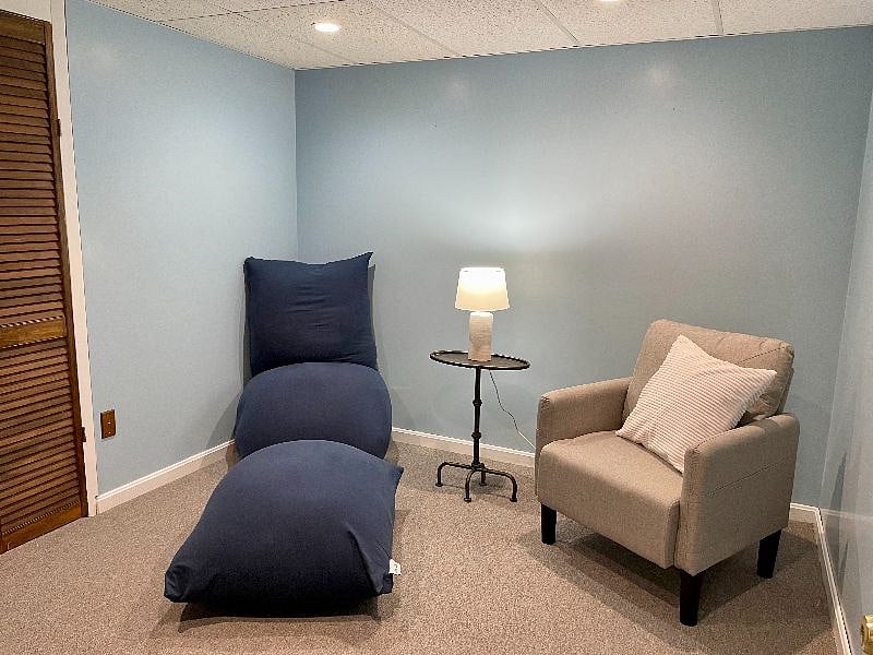 Comfortable seating area that's all yours, including yogibo beanbag chair!