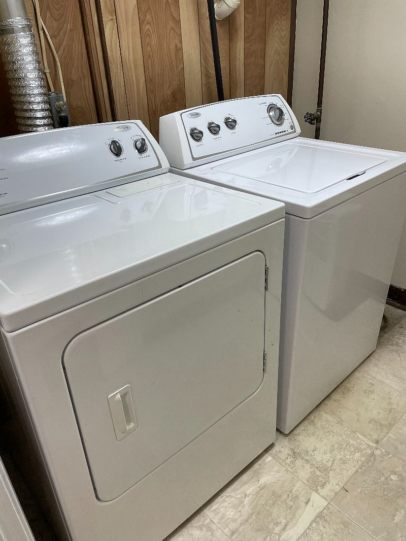 Laundry room is in the finished lower level