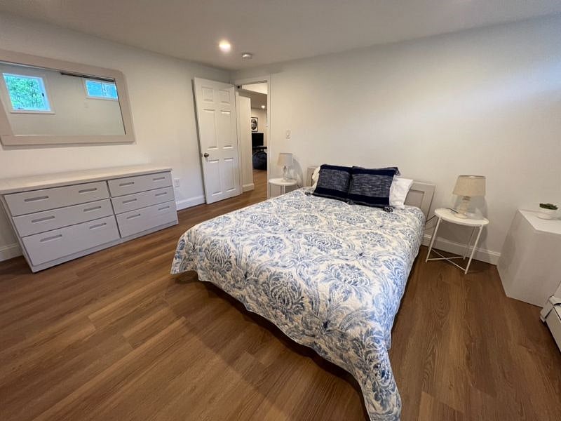 Basement bedroom with queen bed