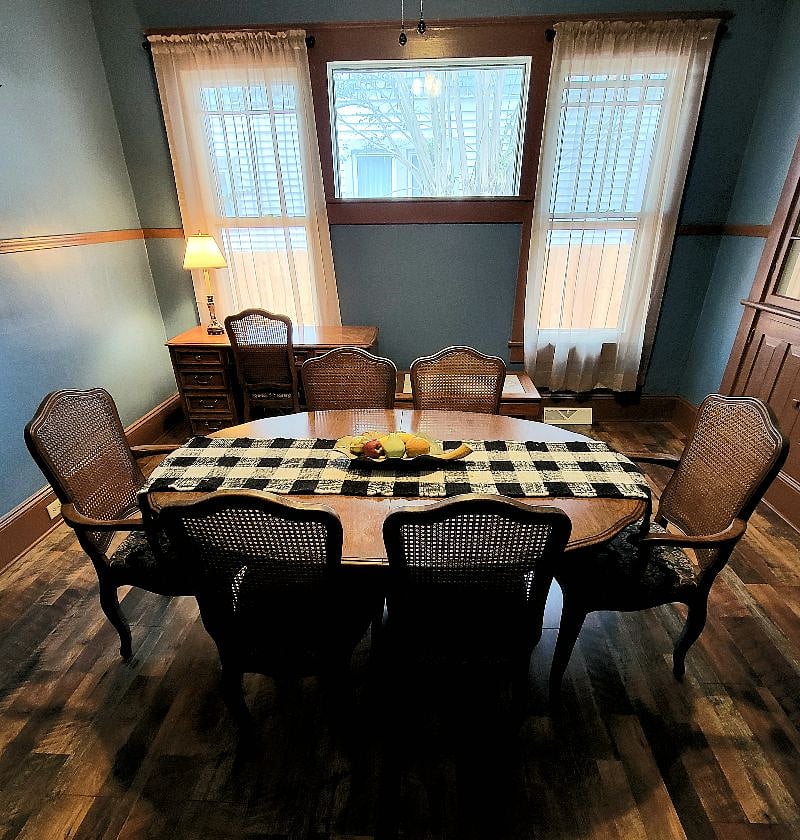 Dining room with dining table and writing desk