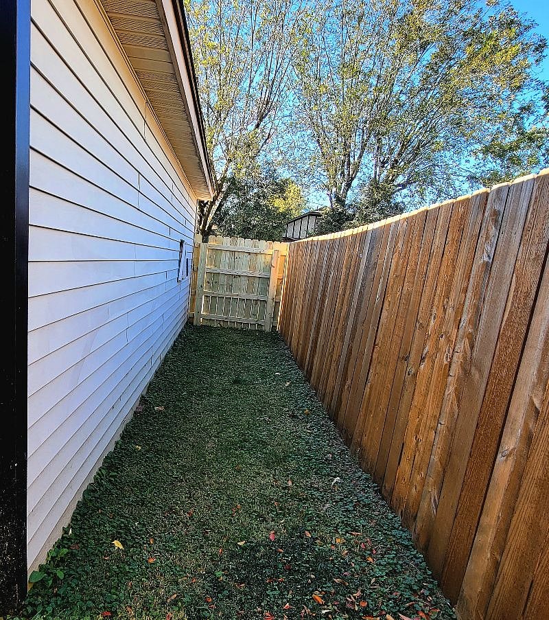 Side of house with privacy fencing