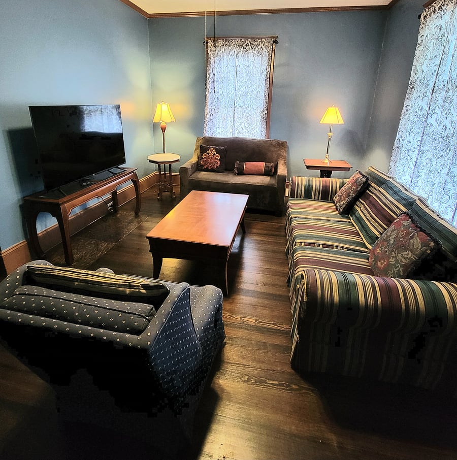 Living room with large screen smart TV
