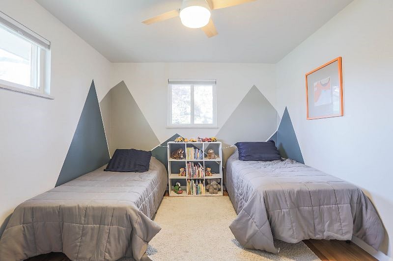 Main floor bedroom with two twin beds