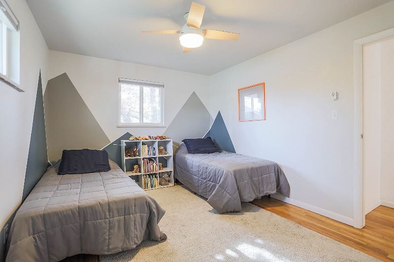 Main floor bedroom with two twin beds
