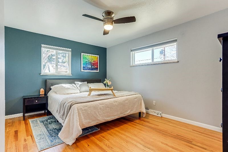 Main floor primary suite with king-sized bed and ensuite bathroom