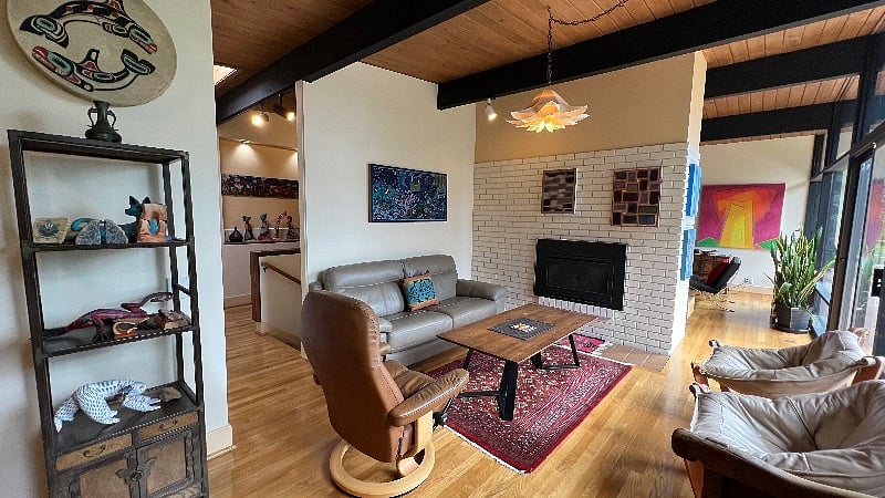 Sitting room opens to dining and kitchen
