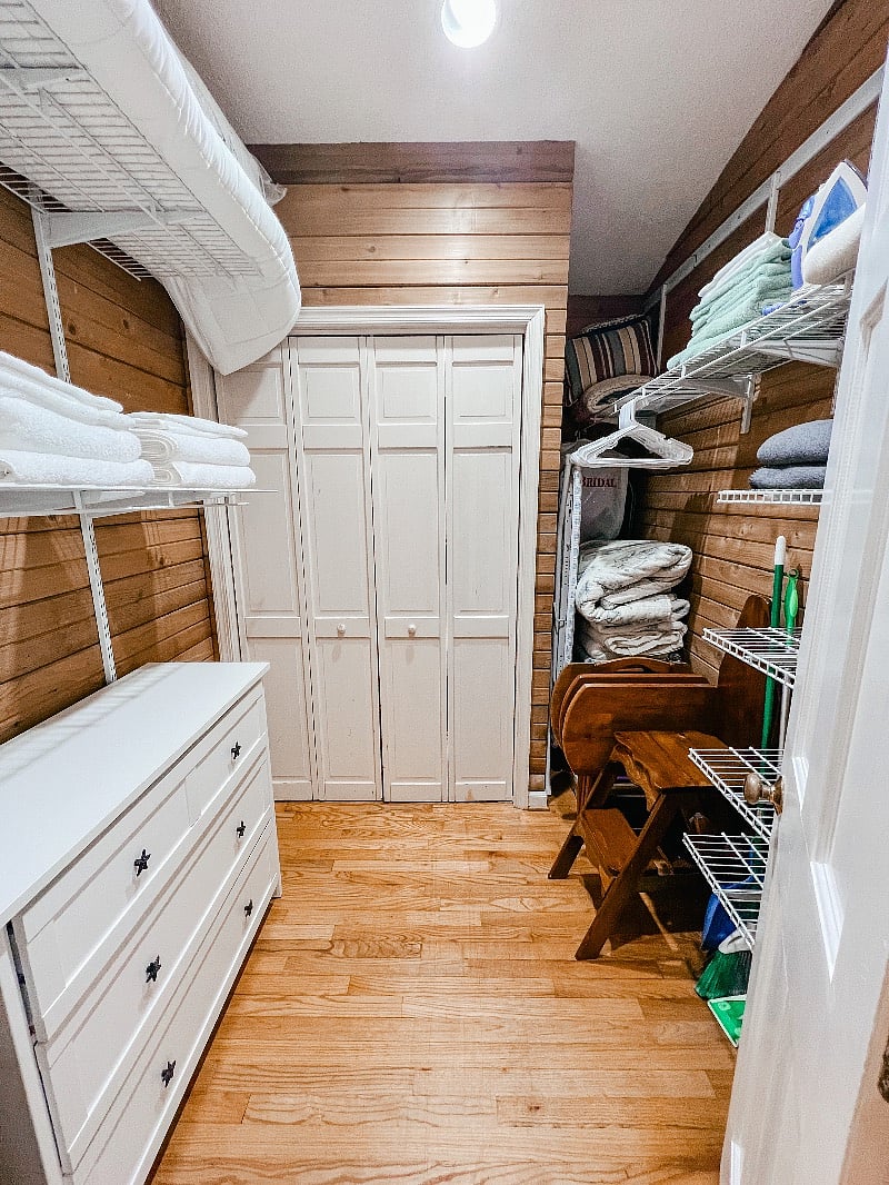 Large walk in closet with ample hanging space.