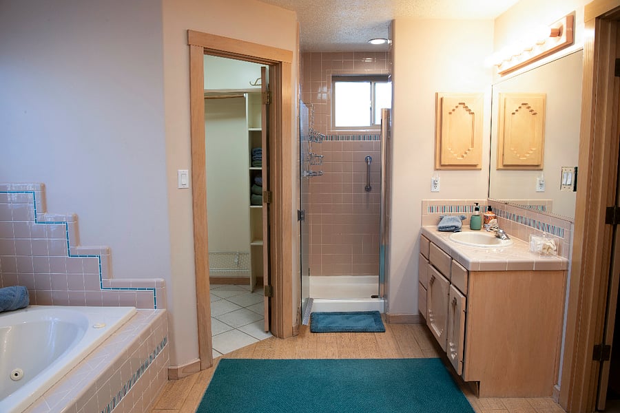 Master Bath with 2 walk in closets, dual vanities, separate shower, tub and water closet