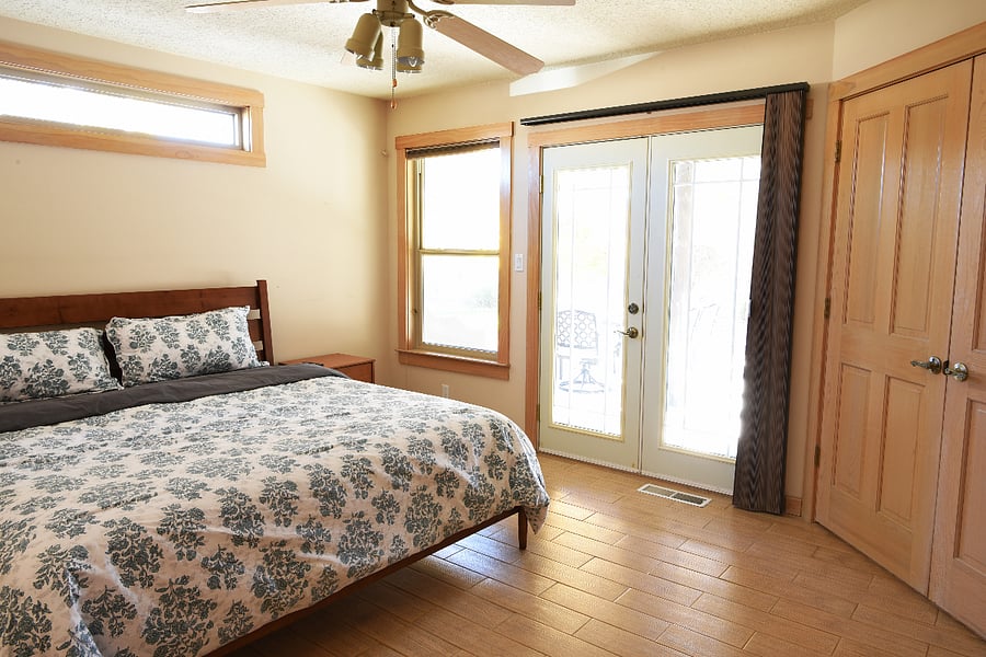 Master Bedroom with access to back patio