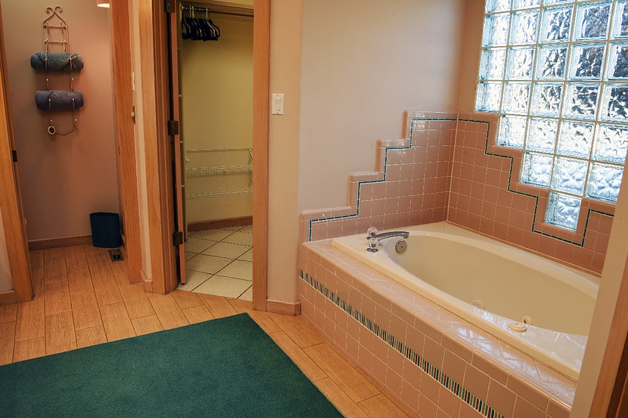 Master Bath with 2 walk in closets, dual vanities, separate shower, tub and water closet
