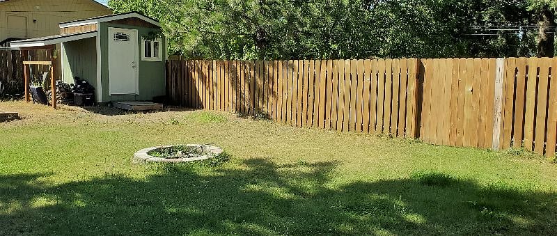 Back yard with fire-pit
(*Note: Shed access is not included)
