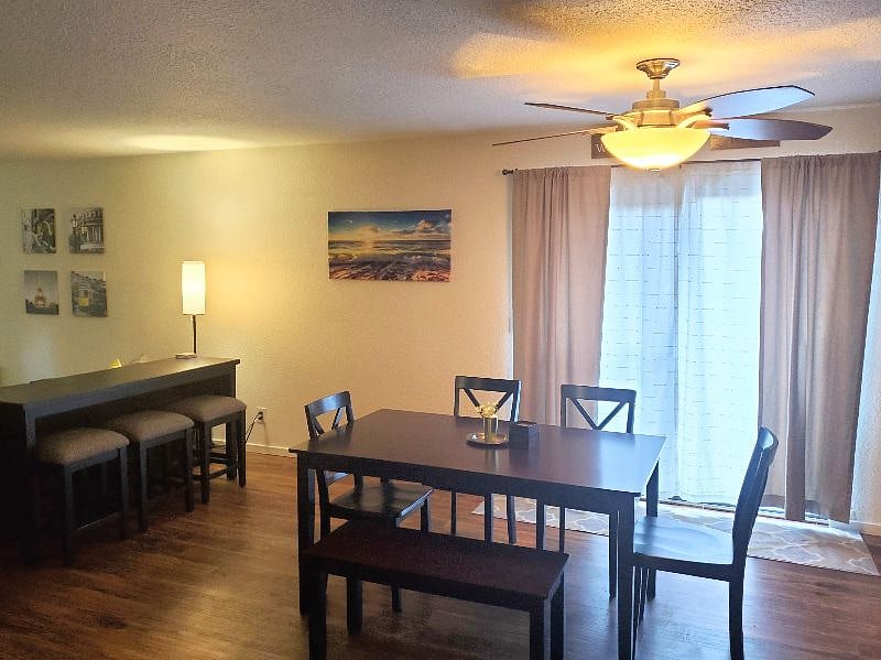 Dining room. Slider door opens to side patio, and provides access to back yard.