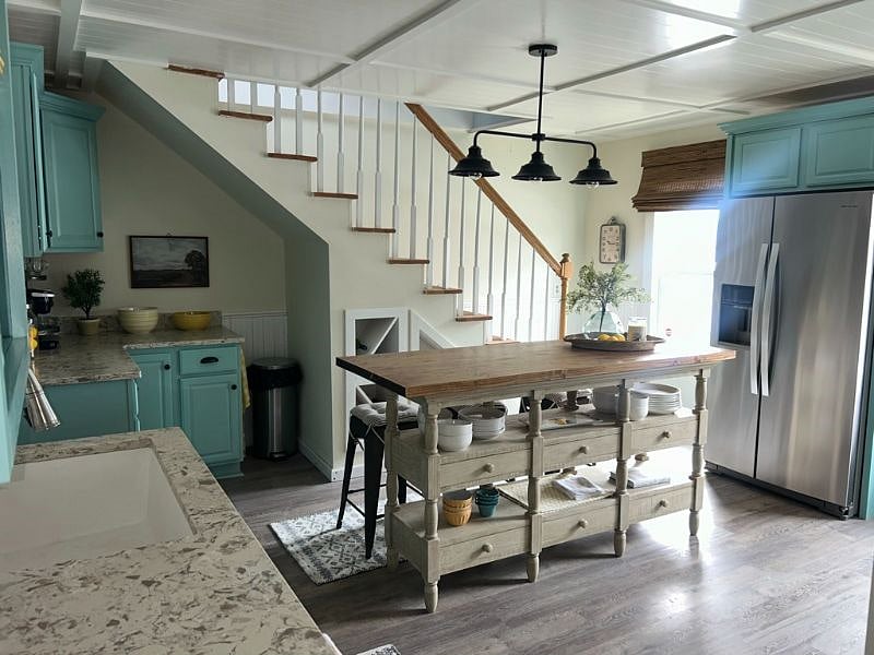 Kitchen & Stairs leading to upstairs bedroom