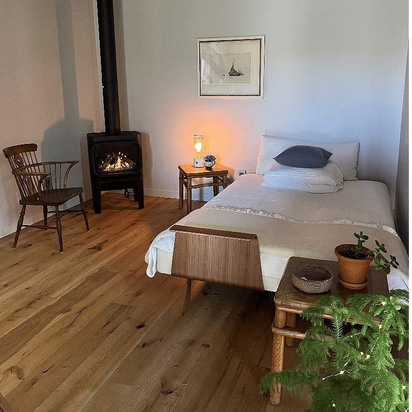 Well designed and smarty planned space features a comfortable queen bed.